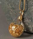 Ziveg Gold Flakes Filled Tomato Shape Pendant