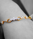 Erato Dainty Flower Design Golden Plated CZ Bracelet