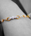 Erato Dainty Flower Design Golden Plated CZ Bracelet